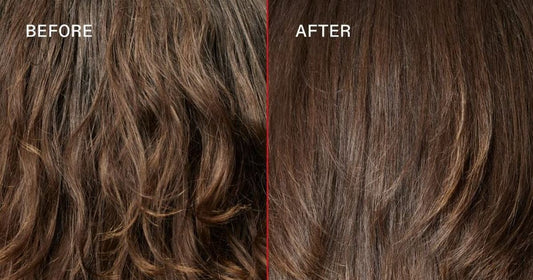 A bottle of Olaplex No.9 hair serum pictured against a neutral background