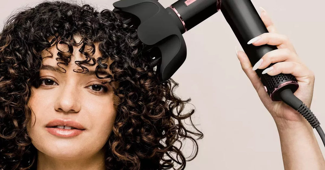Model using the Shark FlexStyle hair styler with a diffuser attachment