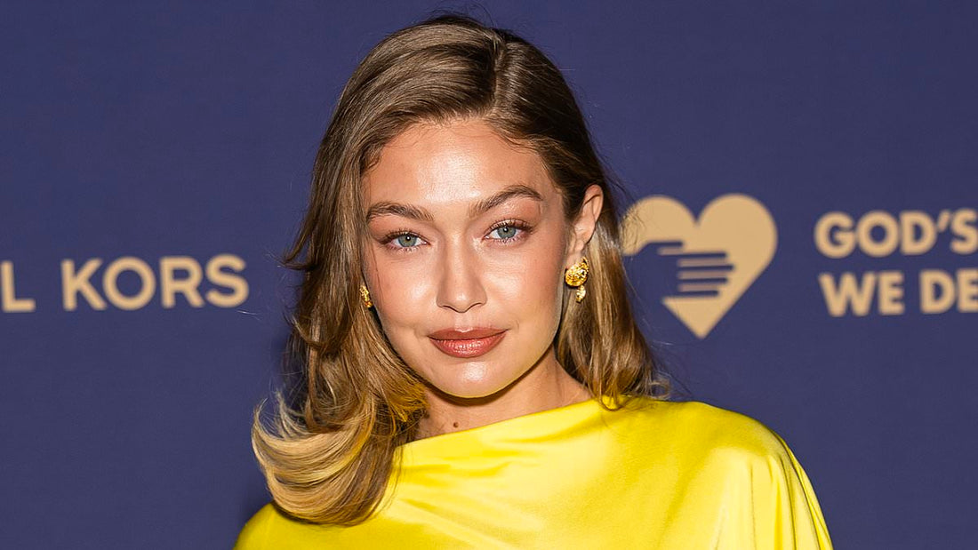 Gigi Hadid with a dark brunette hair transformation in a glamour portrait