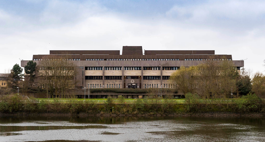 Police tape scene accompanying report of alleged hair‑pulling assault in Glasgow