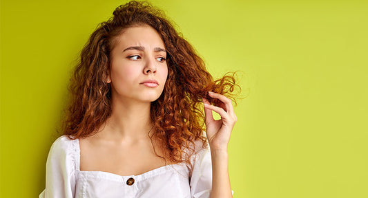 Close-up of diverse hair textures illustrating different levels of hair porosity