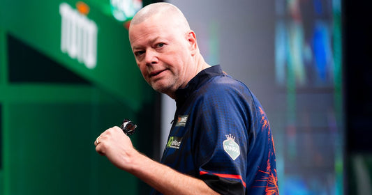 Raymond van Barneveld with a sharply defined hairline and cropped hairstyle