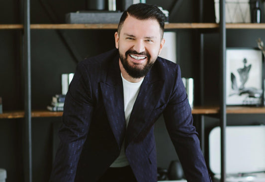 Woman touching her hair outdoors during cold winter weather