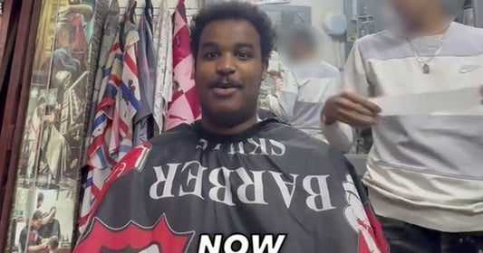 UK traveller getting a haircut at a Moroccan barbershop