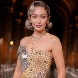 Gigi Hadid wearing a glossy dark bob hairstyle