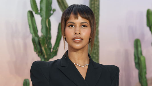 Sabrina Elba in a red dress with cropped baby bangs at the GQ Men of the Year Awards
