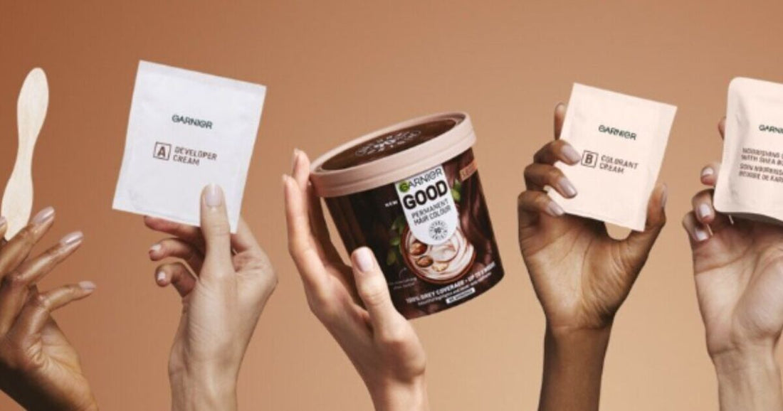 Garnier hair dye mask tube and colour swatches on white background