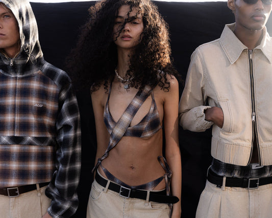 Model with defined curls illustrating a key 2026 hair trend