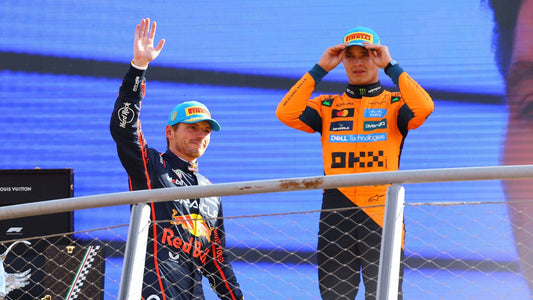 Max Verstappen racing alongside Lando Norris at the Las Vegas Grand Prix