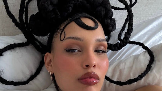 Sculptural holiday hairstyle with gravity-defying shape