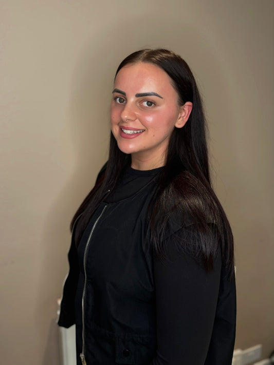 Poppy Jackson, founder of Picture Me Prestige, smiling in salon setting