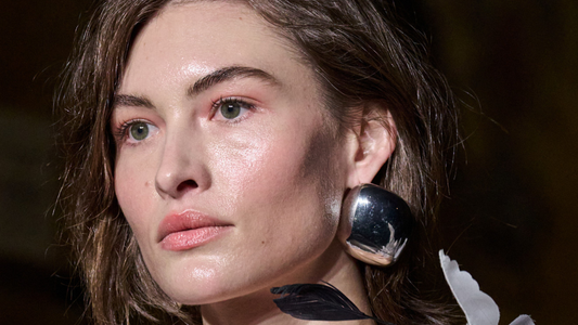 Woman wearing a tousled boho bob haircut with soft texture and movement