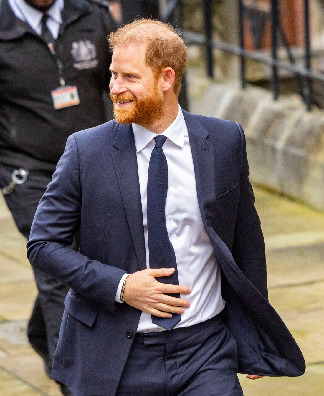 Prince Harry pictured in profile, drawing attention to his hairline