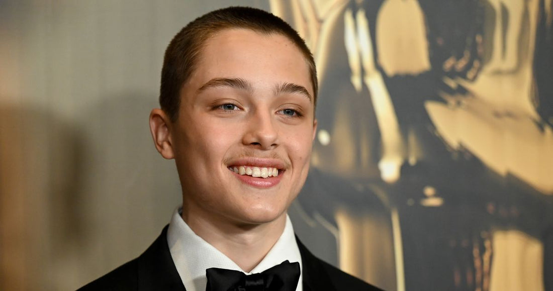 Knox Jolie-Pitt with short bright pink hair, candid street-photo