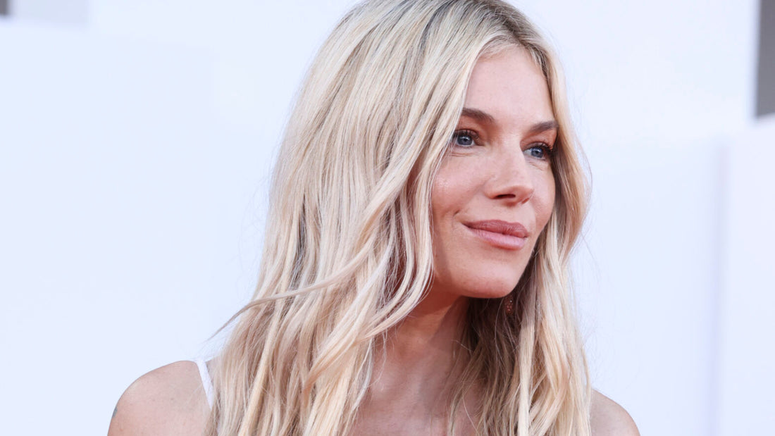 Woman with glossy aspen waves hairstyle wearing winter fashion