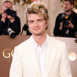 Joe Keery on the Golden Globes red carpet with newly bleached blonde hair