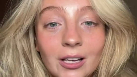 Portrait of Elle McNamara with luminous skin and sleek hair, showcasing a youthful finish