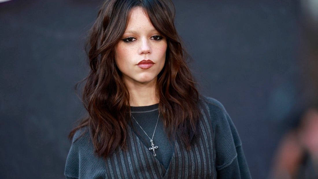 Model with tousled mid-length layered haircut