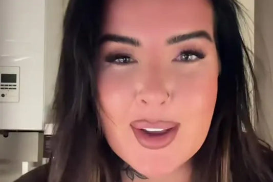 Woman in a kitchen preparing a festive roast dinner