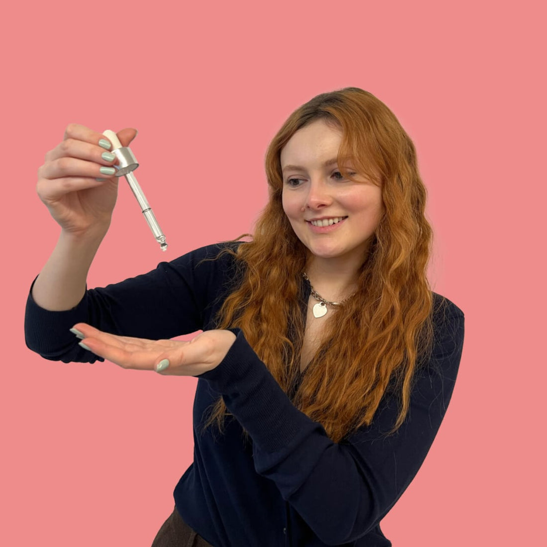 Woman with long, glossy hair in an editorial portrait
