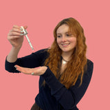 Woman with long, glossy hair in an editorial portrait